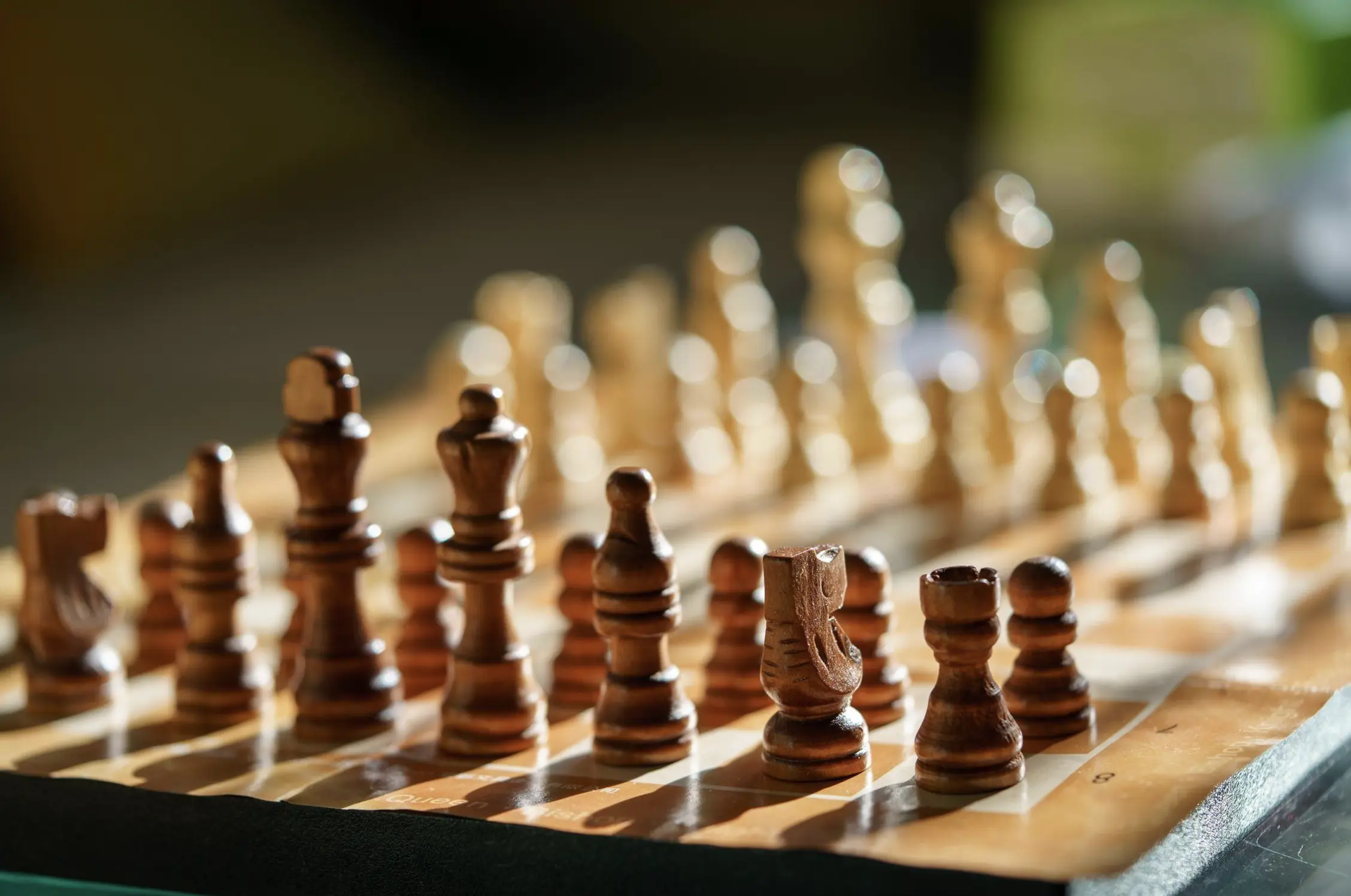 Chess pieces in the background